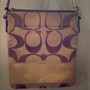 Coach crossbody with gold accent